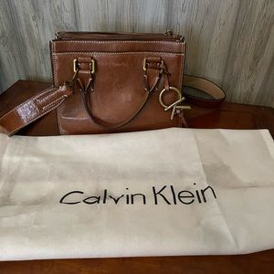 Calvin Klein bag 9.5 long across bottom and 7” high